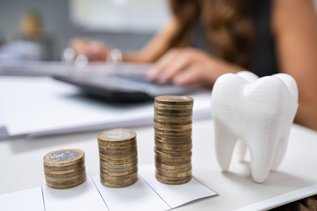 Dental implant cost estimate in Ontario with tooth model and calculator